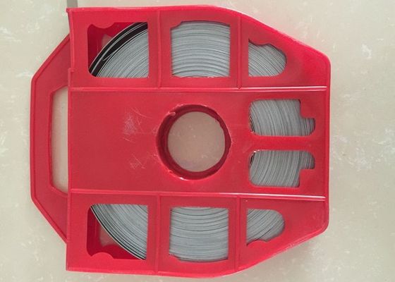 China High Tensile Steel Strapping Belt , Metal Banding Strap With Red Plastic Dispenser supplier